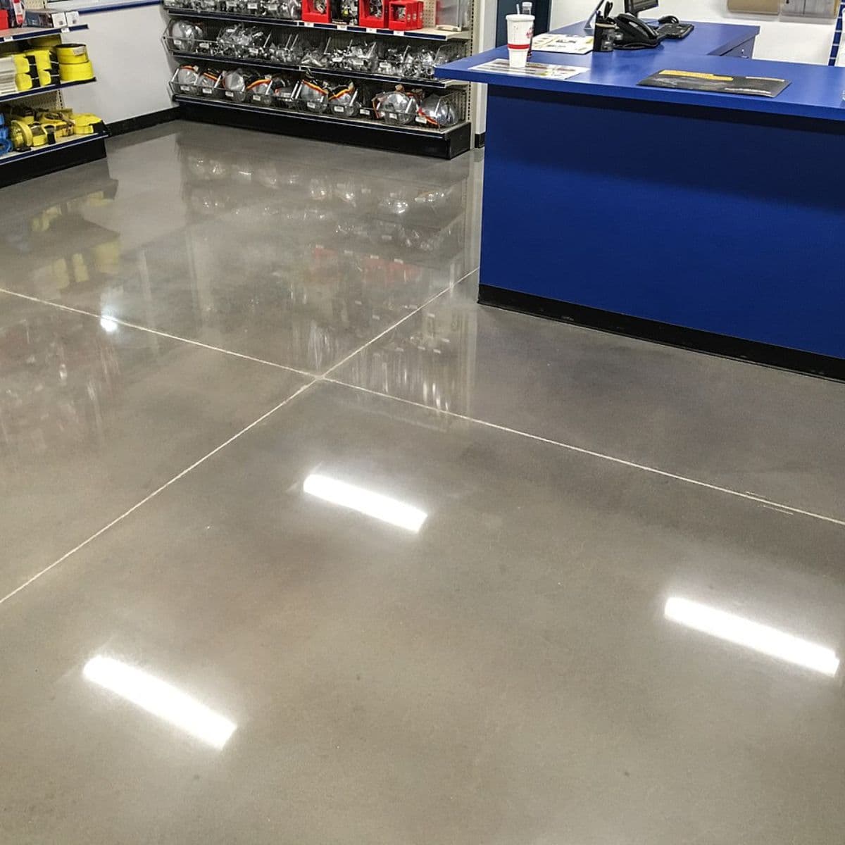 High-gloss polished concrete floor with reflective finish