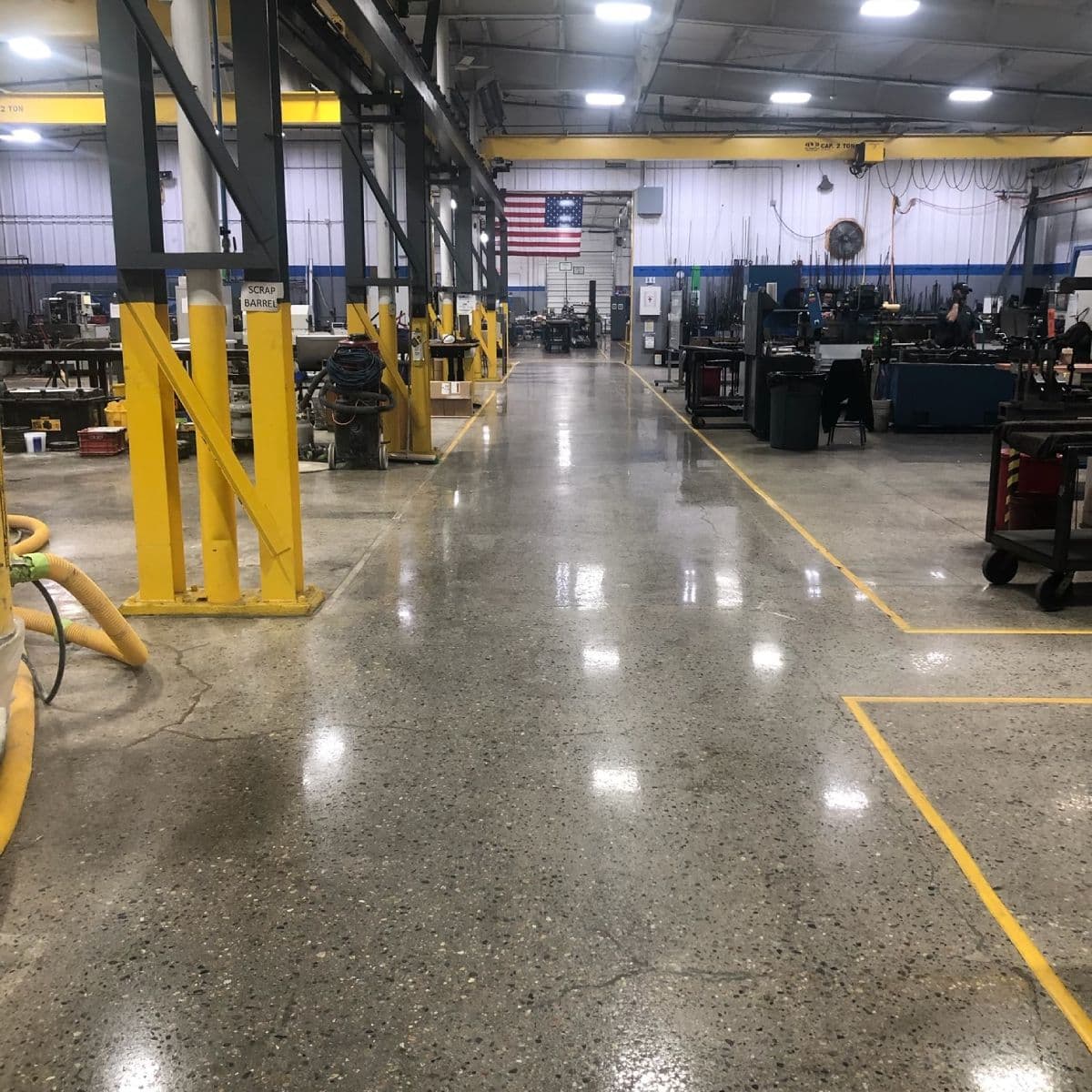 High-traffic polished concrete in construction warehouse